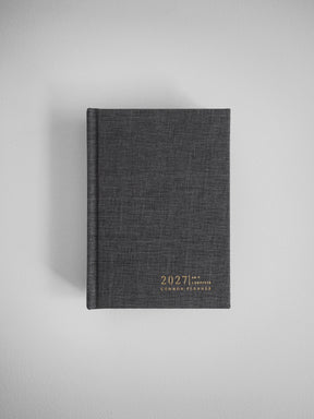 2027 A6 Vertical Complete planner interior layout in Charcoal #color_charcoal