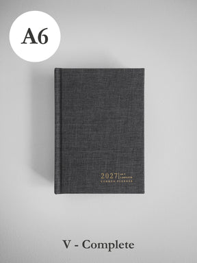 2027 A6 Vertical Complete (hardcover) planner front cover in Charcoal #color_charcoal