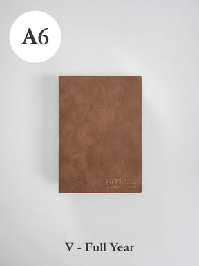 2027 A6 Vertical Full year planner front cover in Caramel #color_caramel