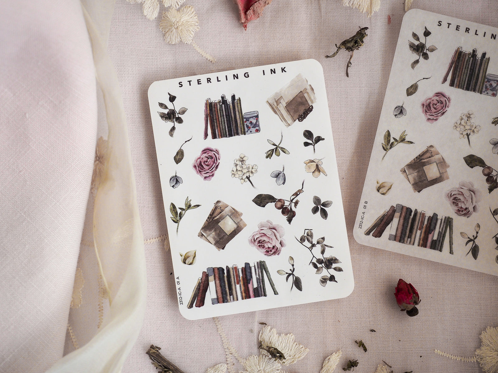 Mini sticker sheet of botanical and rustic elements featuring pressed roses, assorted leaves, and stacked vintage rectangular blocks in earthy tones.