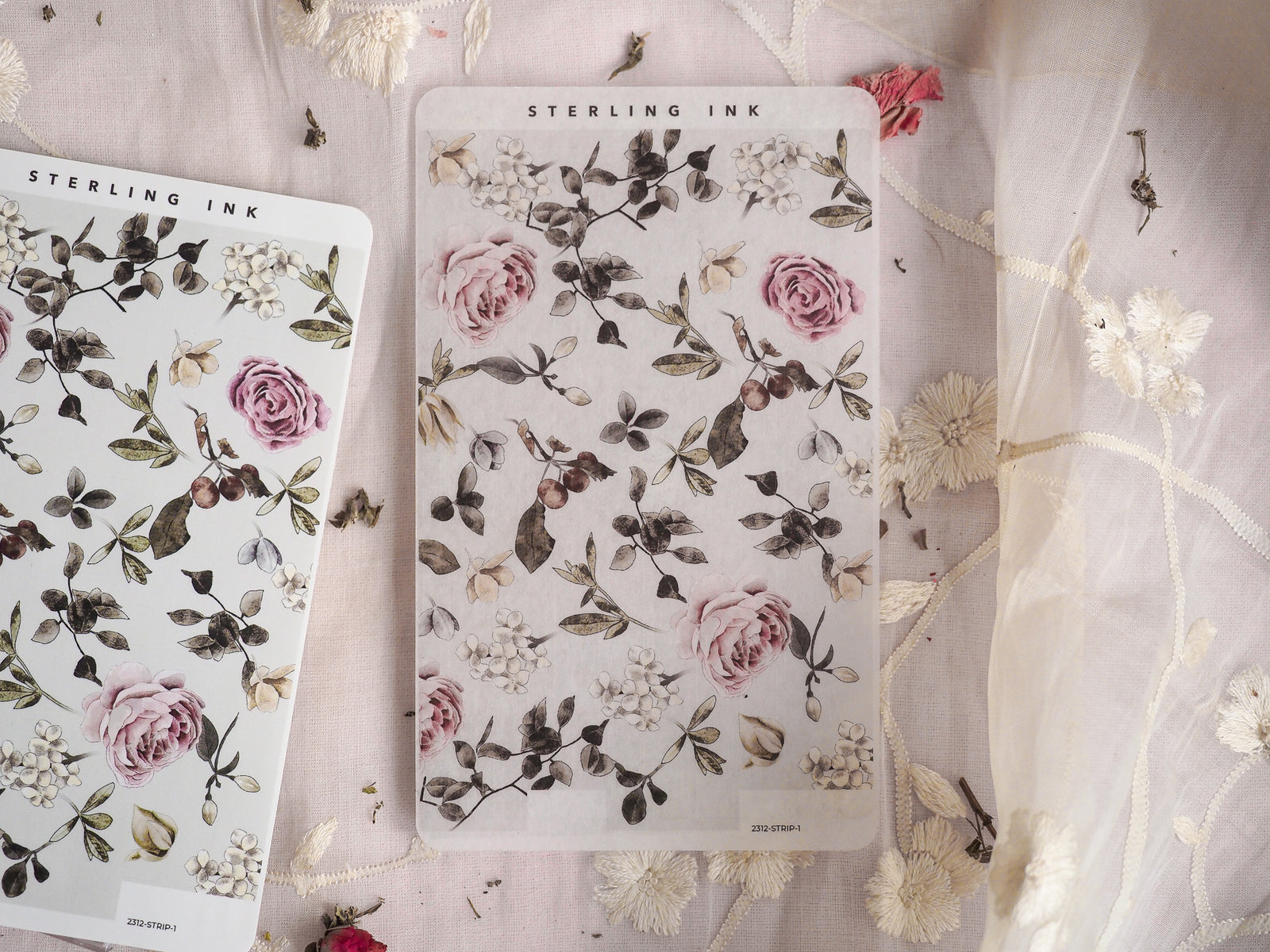 Botanical sheet stickers featuring a delicate arrangement of muted pink roses, rich green foliage, and creamy white blossoms.