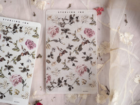 Botanical sheet stickers featuring a delicate arrangement of muted pink roses, rich green foliage, and creamy white blossoms.