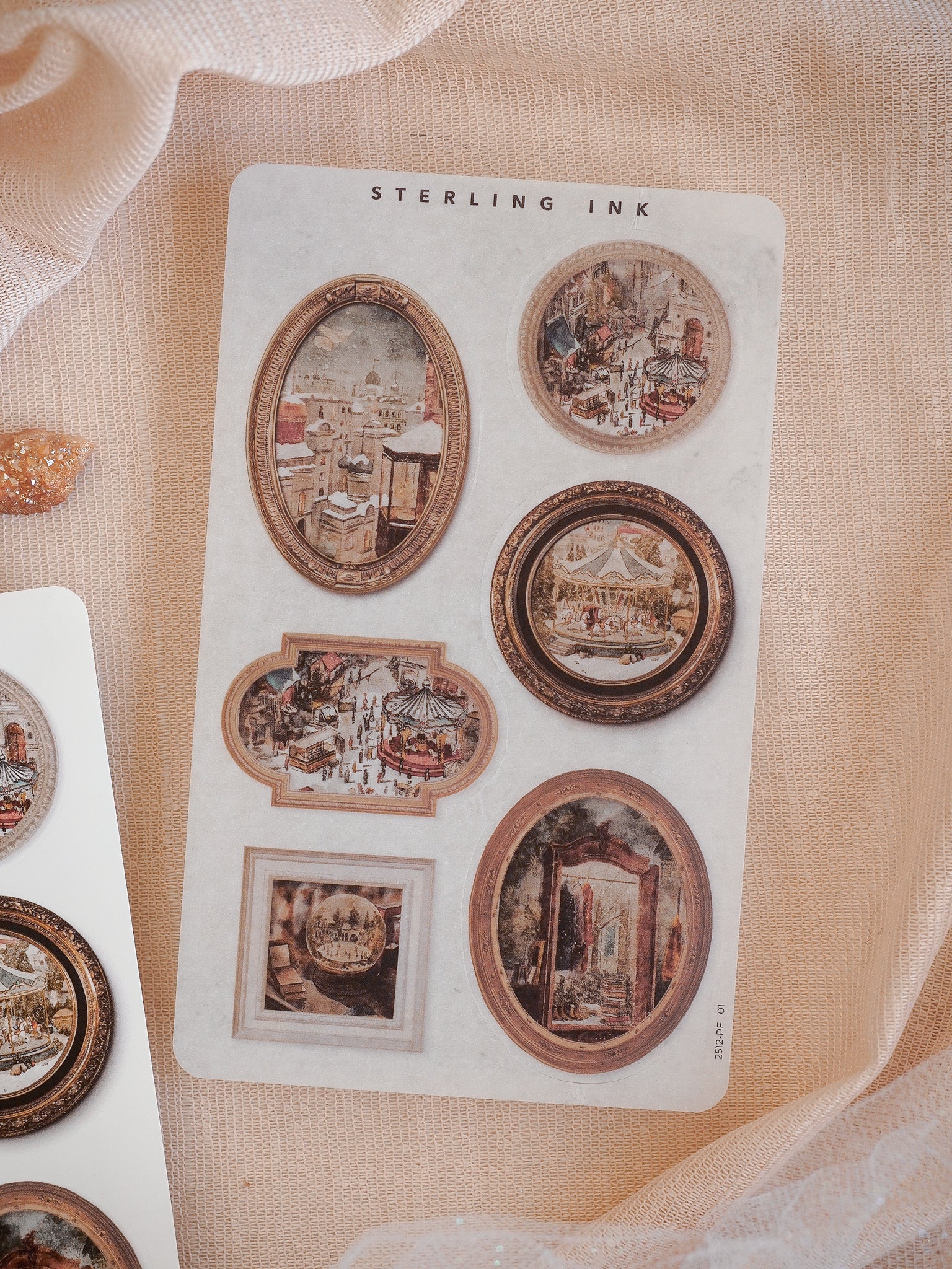 Ornamental sticker set featuring die-cut picture frames depicting nostalgic December vignettes, festive holiday markets, and vintage winter scenes.