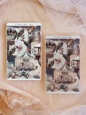 Festive sticker sheets featuring a snowy December market scene with charming Victorian-style stalls, delicate flowers, and nostalgic holiday decorations.