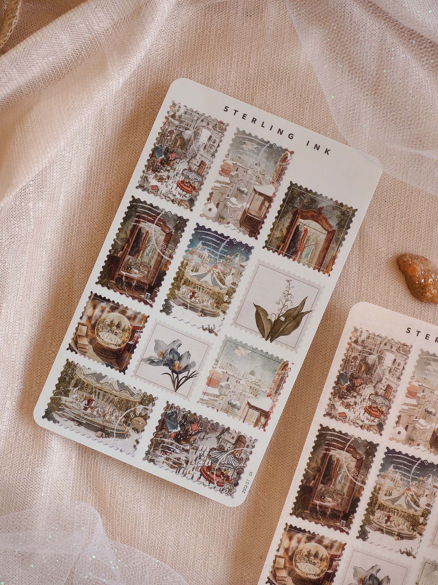 Vintage sticker sheet featuring detailed, antique architectural scenes, seasonal motifs, and delicate floral illustrations for creative craft journaling.
