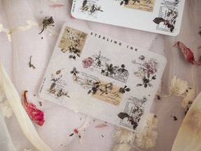 Sepia-toned journaling stickers featuring vintage stamps, antique documents, and delicate floral corner accents highlighted with realistic silver foil.