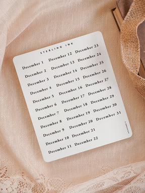 White sticker sheet featuring a clean, organized calendar layout for December 2025, listing all dates 1 through 31 in black text from STERLING INK.