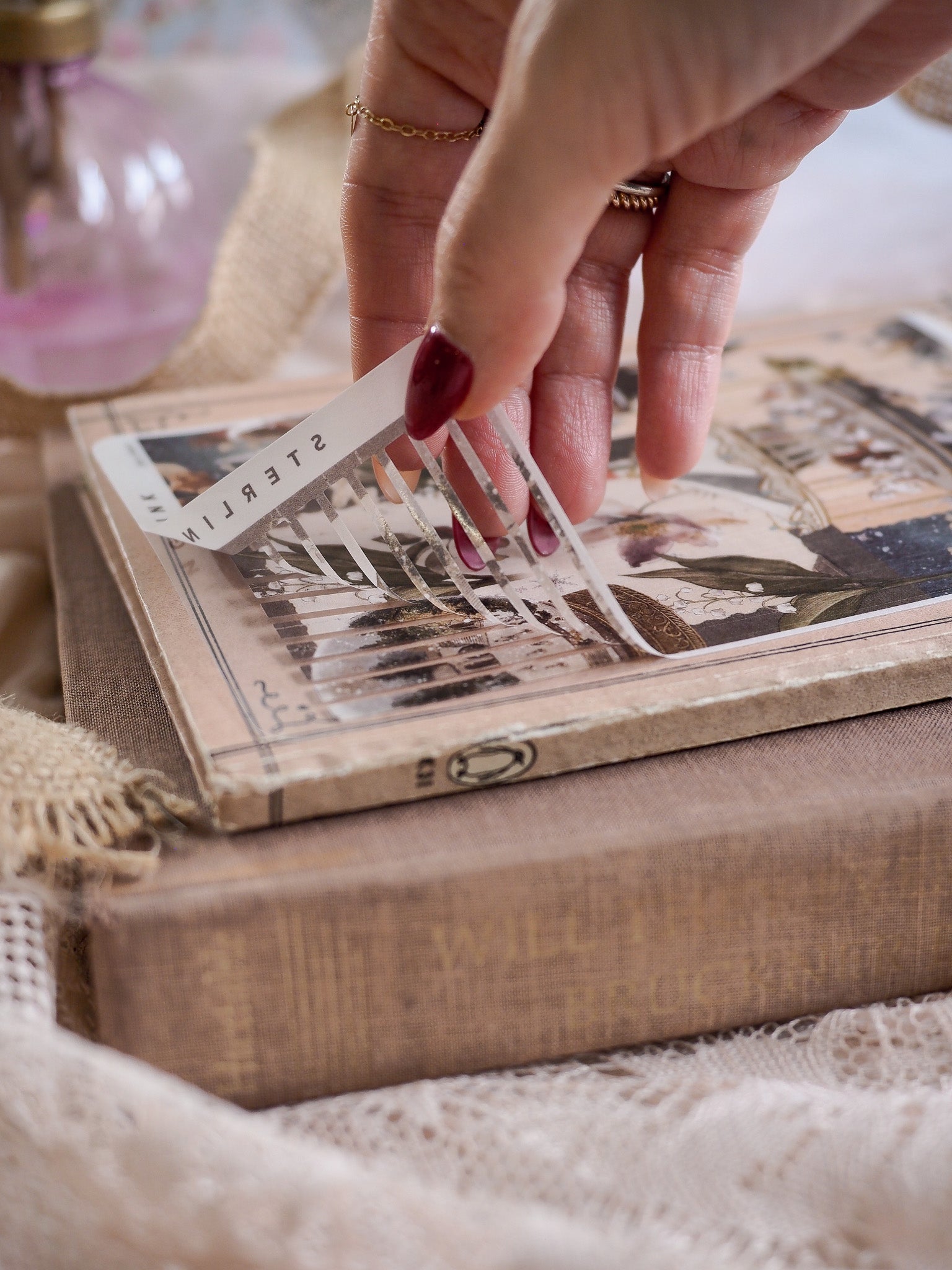 Vintage illustrated thin sticker strip for December 2025, featuring detailed seasonal graphics in a distressed, nostalgic design.
