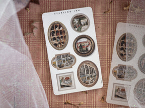 A seasonal set of decorative picture frame stickers featuring vintage architectural elements and ornate designs perfect for holiday crafting and scrapbooking.