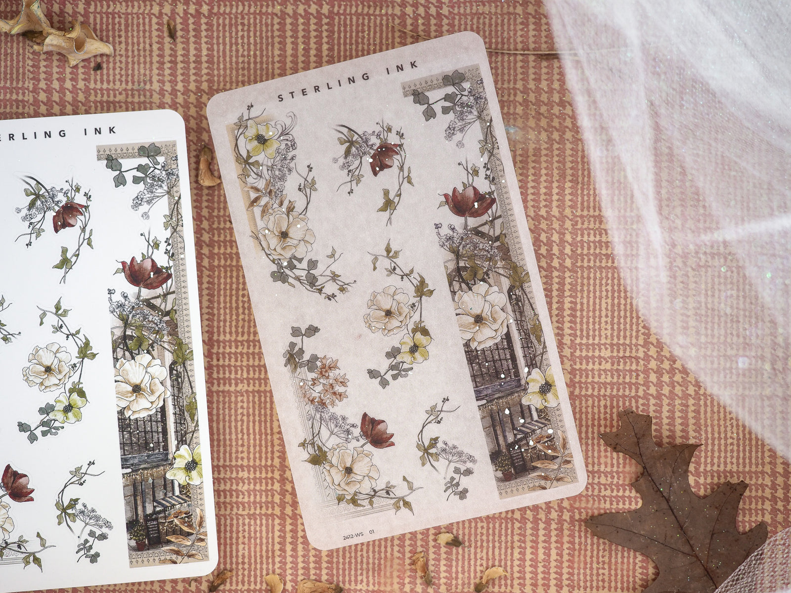 Decorative washi stickers featuring rich autumnal florals, detailed foliage, and ornate architectural elements in a muted palette of creams, browns, and deep burgundies.