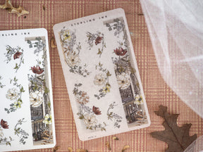 Decorative washi stickers featuring rich autumnal florals, detailed foliage, and ornate architectural elements in a muted palette of creams, browns, and deep burgundies.