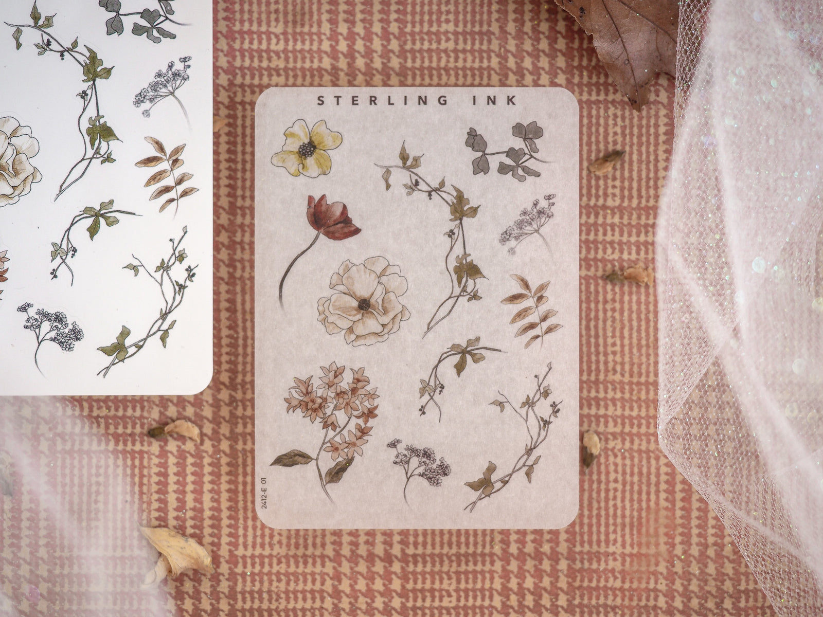 Botanical elements sticker sheet featuring delicate, vintage illustrations of florals, leaves, and foliage in muted brown ink.