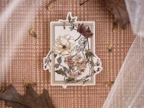 Elegant seasonal vinyl sticker featuring a detailed floral arrangement of creamy white, muted blush, and deep burgundy autumn blooms.