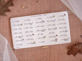Elegant white sticker sheet featuring a detailed, hand-lettered floral calligraphy pattern listing every weekday from Monday through Sunday.