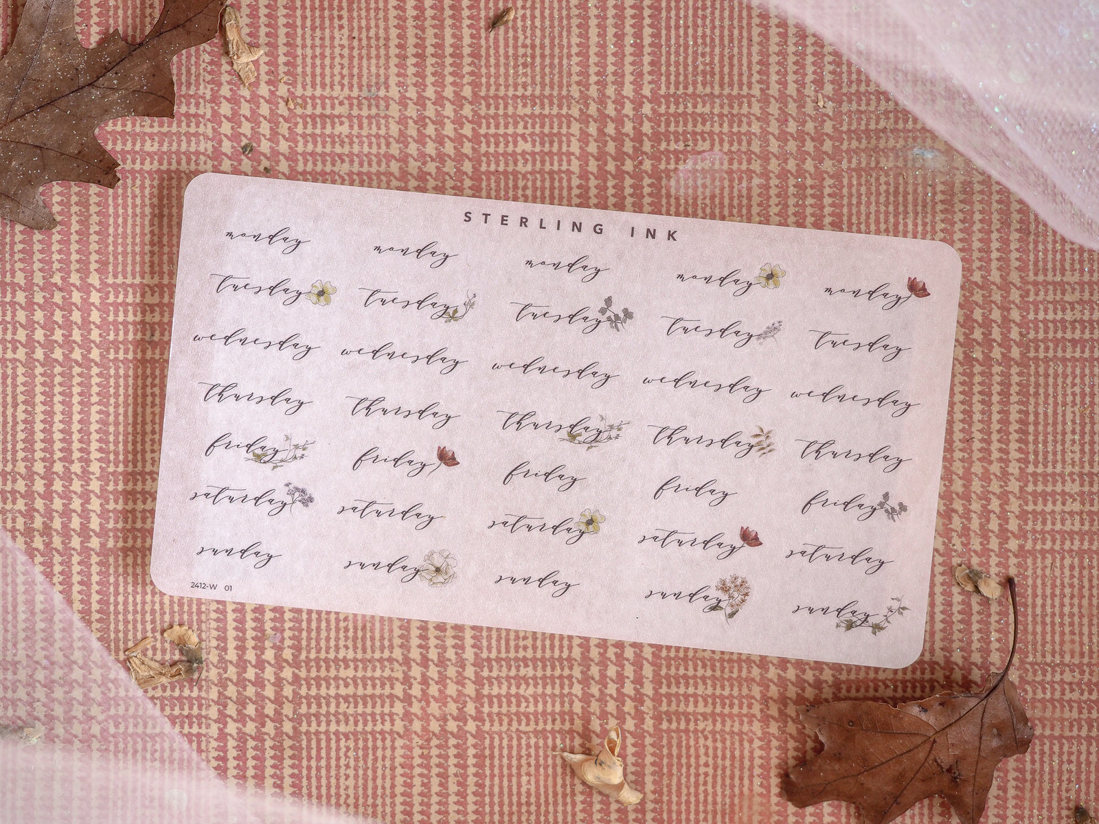 White sticker set with delicate cursive typography for weekly planning labels, featuring organized text for a December 2024 calendar layout.