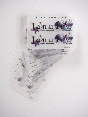 Watercolor floral stickers for monthly journaling, showcasing delicate purple blossoms and greenery for planner decoration.
