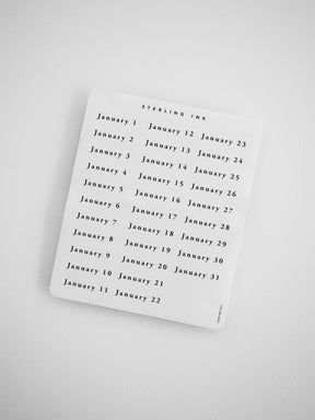 Sticker sheet collection showing a monthly planner layout from January through December, featuring simple black text on clean white paper for organizational journaling.