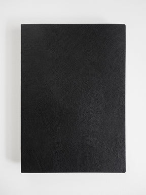 Solid, matte black rectangular cover with a finely textured, subtle grain that provides a sophisticated, deep black aesthetic.