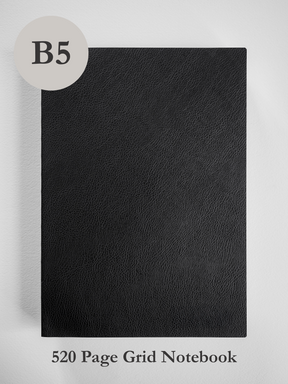 Sleek, matte black B5 notebook featuring a smooth, sophisticated faux leather cover designed for 520 pages of detailed writing.