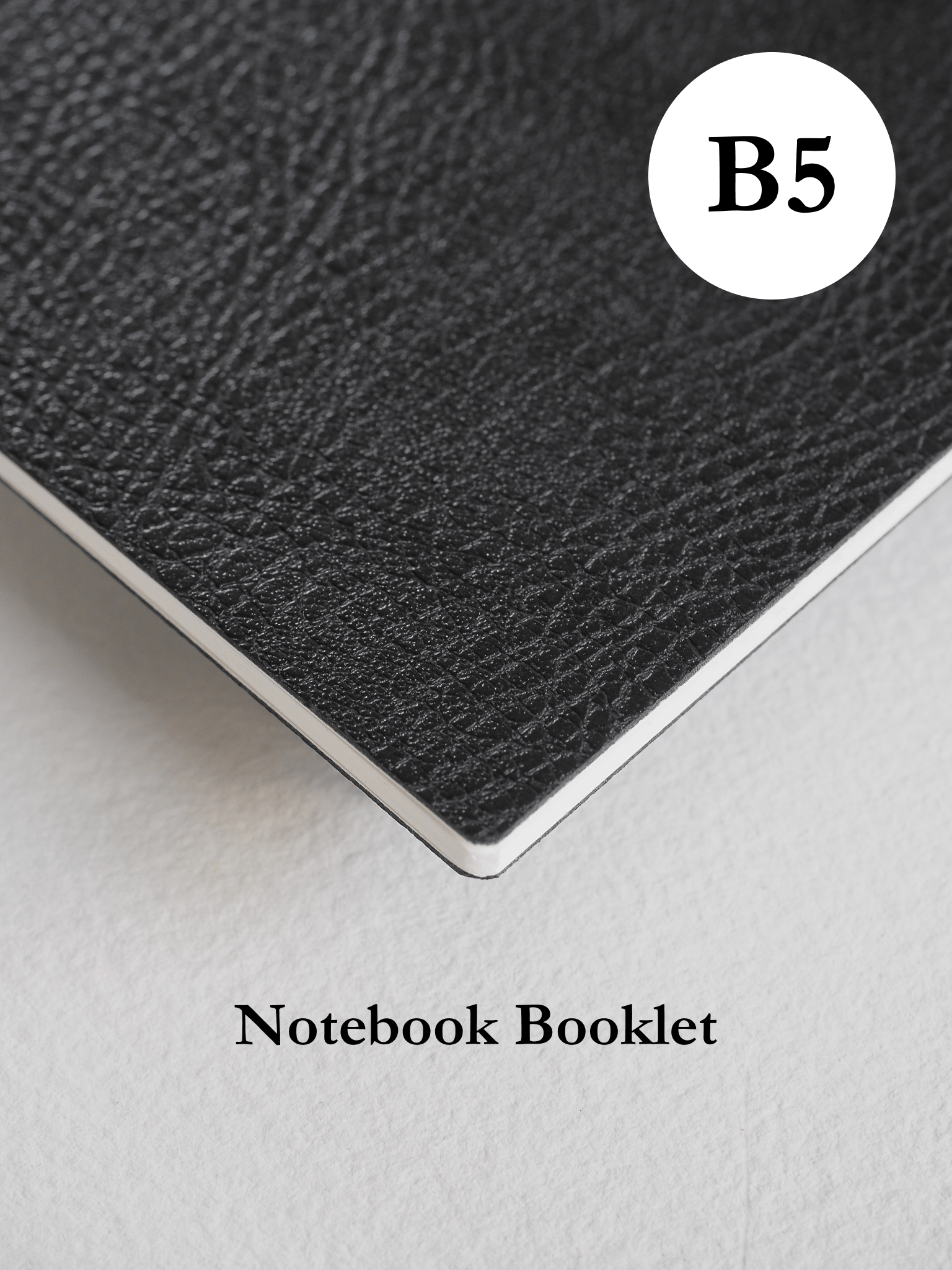 Minimalist B5 notebook booklet featuring a dark, charcoal-black cover with a sophisticated, pebbled texture for everyday note-taking.
