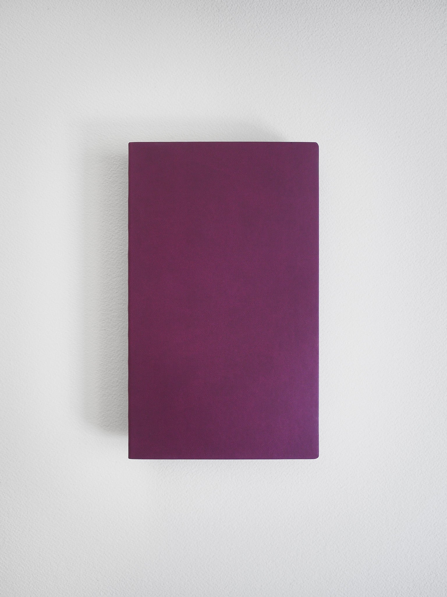 Solid, unpatterned B6 notebook cover in a rich, deep plum color, ideal for general writing and planning while maintaining a clean, minimalist aesthetic.