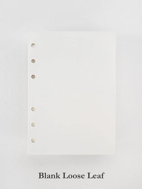 Pure white, unprinted loose leaf paper, featuring multiple uniform perforations across the top edge for easy ring binding and filing.