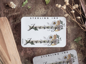 Elegant "January" month sticker featuring botanical wreaths, eucalyptus greenery, and natural floral accents for scrapbooking or journaling.