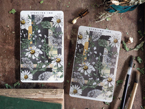 Two floral sticker sheets featuring a botanical pattern of white and yellow dandelions surrounded by abundant dark green foliage.