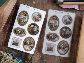 Ornate picture frame stickers featuring sepia-toned, vintage scenes of rustic antique shop interiors, perfect for journaling or scrapbooking.