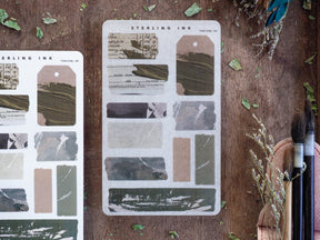 Collection of decorative torn tape stickers featuring an array of natural, earthy tones—including beige, brown, and slate gray—perfect for journaling and scrapbooking.