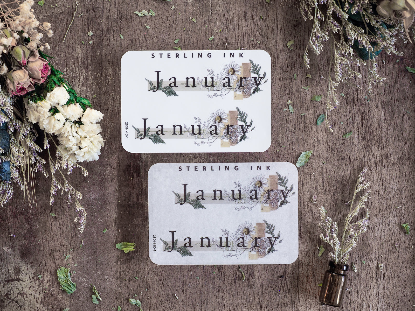 Elegant January month stickers featuring rustic botanical designs with watercolor greenery, delicate wood accents, and beautiful typography.