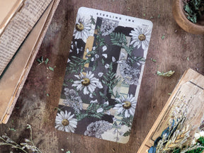 Boho floral deco sheet for January 2025, featuring a vintage collage pattern of white daisies, lush green foliage, and contrasting natural background squares.