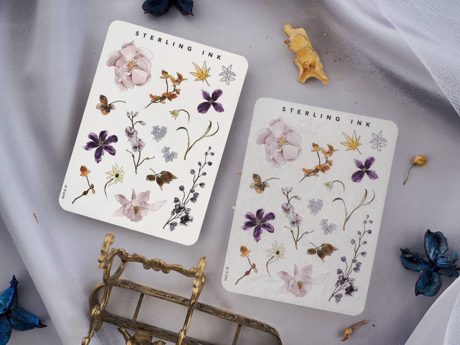 Decorative "Elements Stickers" featuring detailed botanical designs and watercolor illustrations of pink, purple, and yellow flowers and leafy sprigs.