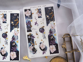 Romantic January 2024 washi strip stickers showcasing delicate watercolor florals and blossoms set against a dark navy and celestial starry night background.