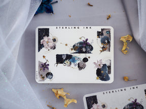 Vibrant watercolor sticker set featuring clusters of dark floral motifs, peonies, and botanical elements accented with elegant silver foil details.