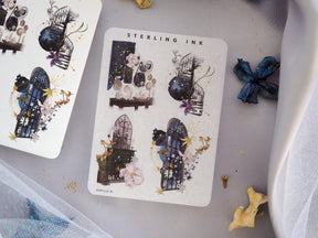 Vintagewear set of decorative icon stickers featuring deep blue gothic architecture, dramatic windows, and ornate floral accents with shimmering foil details.