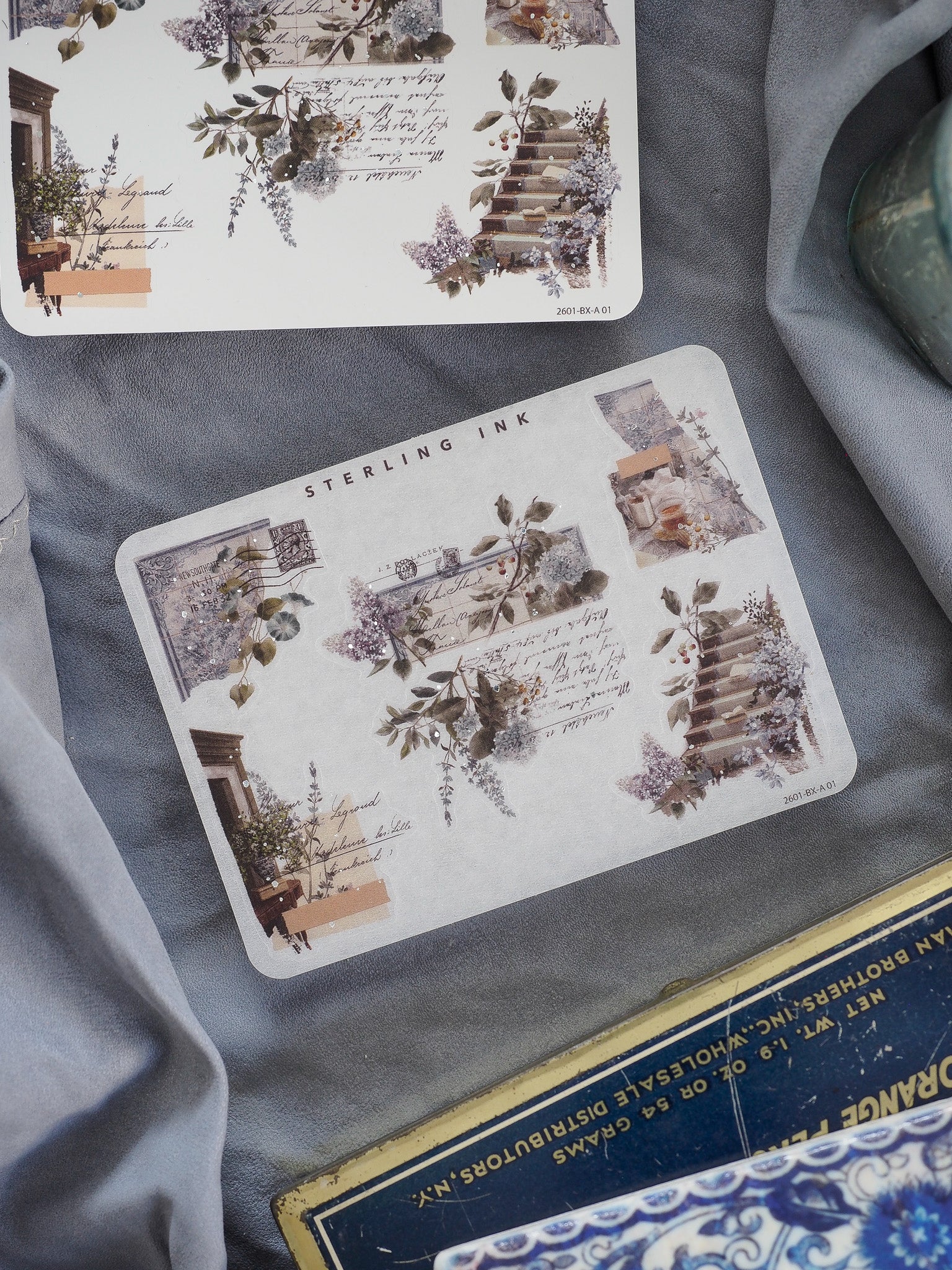 Botanical and vintage-themed sticker sheets featuring delicate floral sprays, sepia-toned engravings, and intricate leaf patterns for elegant scrapbooking details.