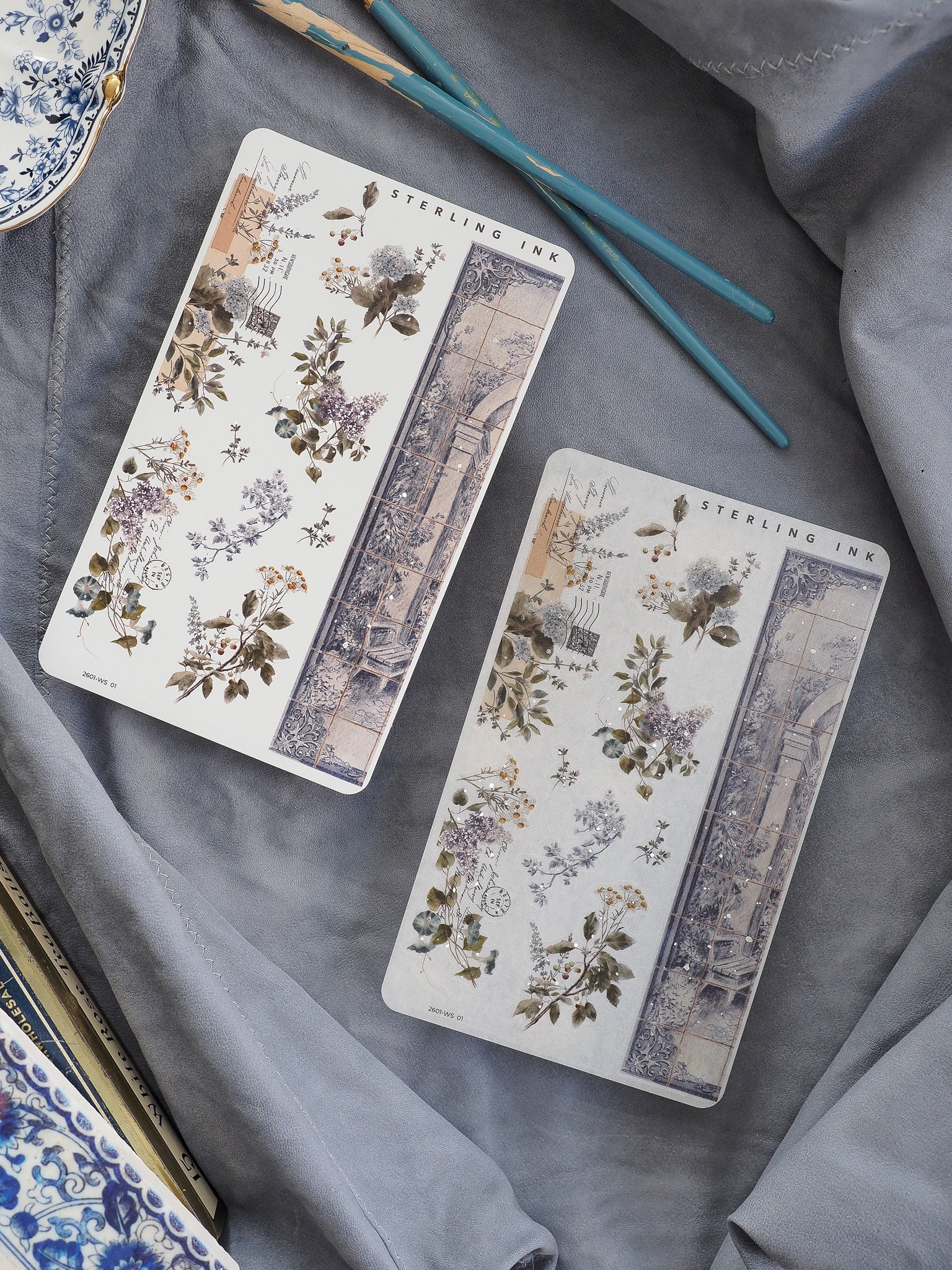 Elegant washi strip stickers featuring detailed, vintage botanical arrangements mixed with subtle antique architectural vignettes in muted, nature-inspired tones.