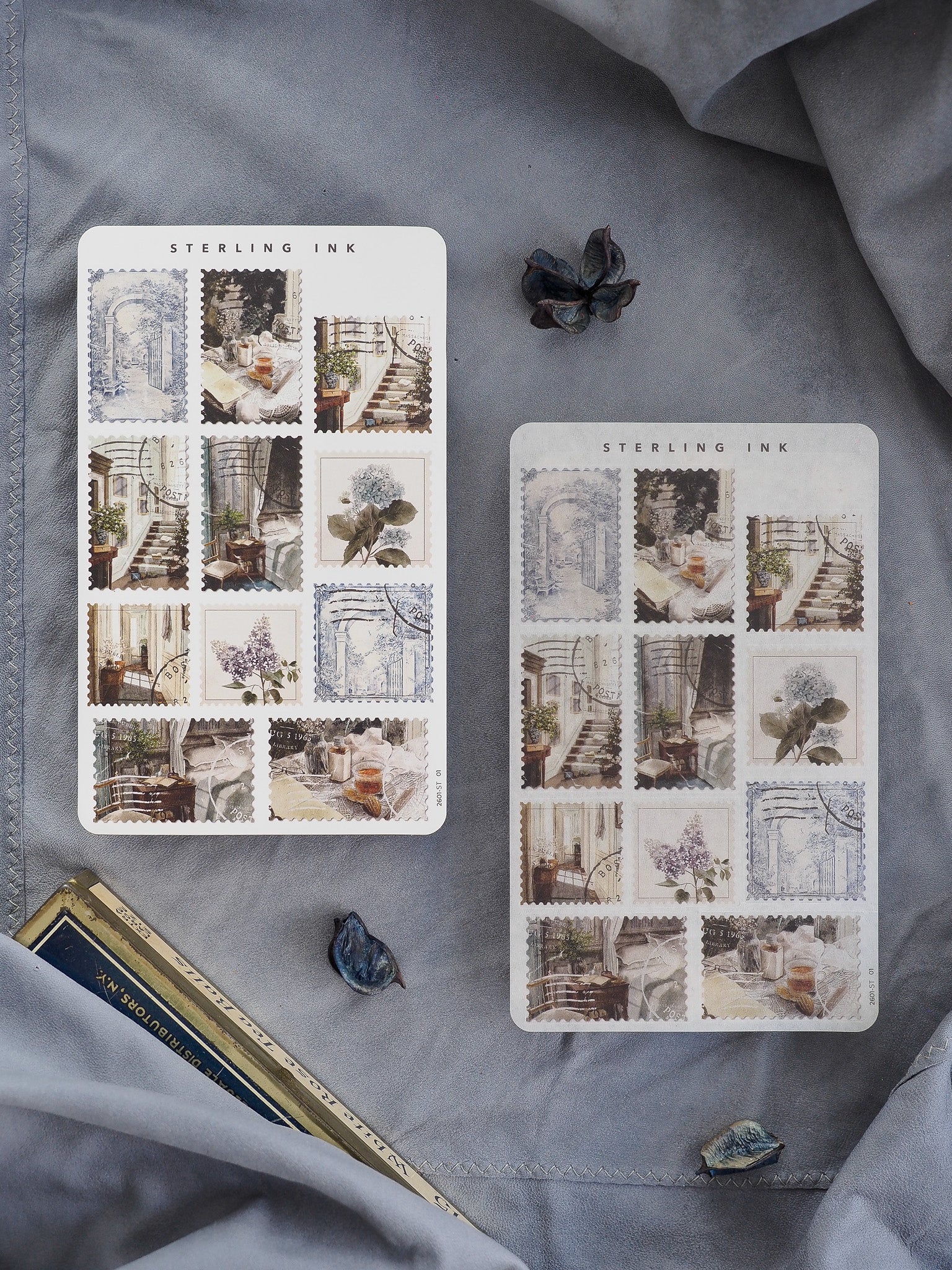 Two sheets of delicate, vintage-themed stamps featuring a grid pattern of botanical and architectural indoor scenes in soft, muted watercolor tones.