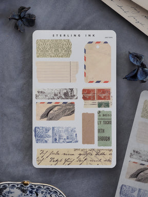 A curated assortment of vintage torn tape stickers featuring floral patterns, blank strips, ticket stubs, and antique ephemera perfect for journaling and scrapbooking.