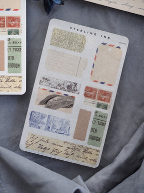 Vintage-themed distressed "torn tape" stickers featuring antique labels, receipts, and faded postal elements in rustic beige and sepia tones for journaling.