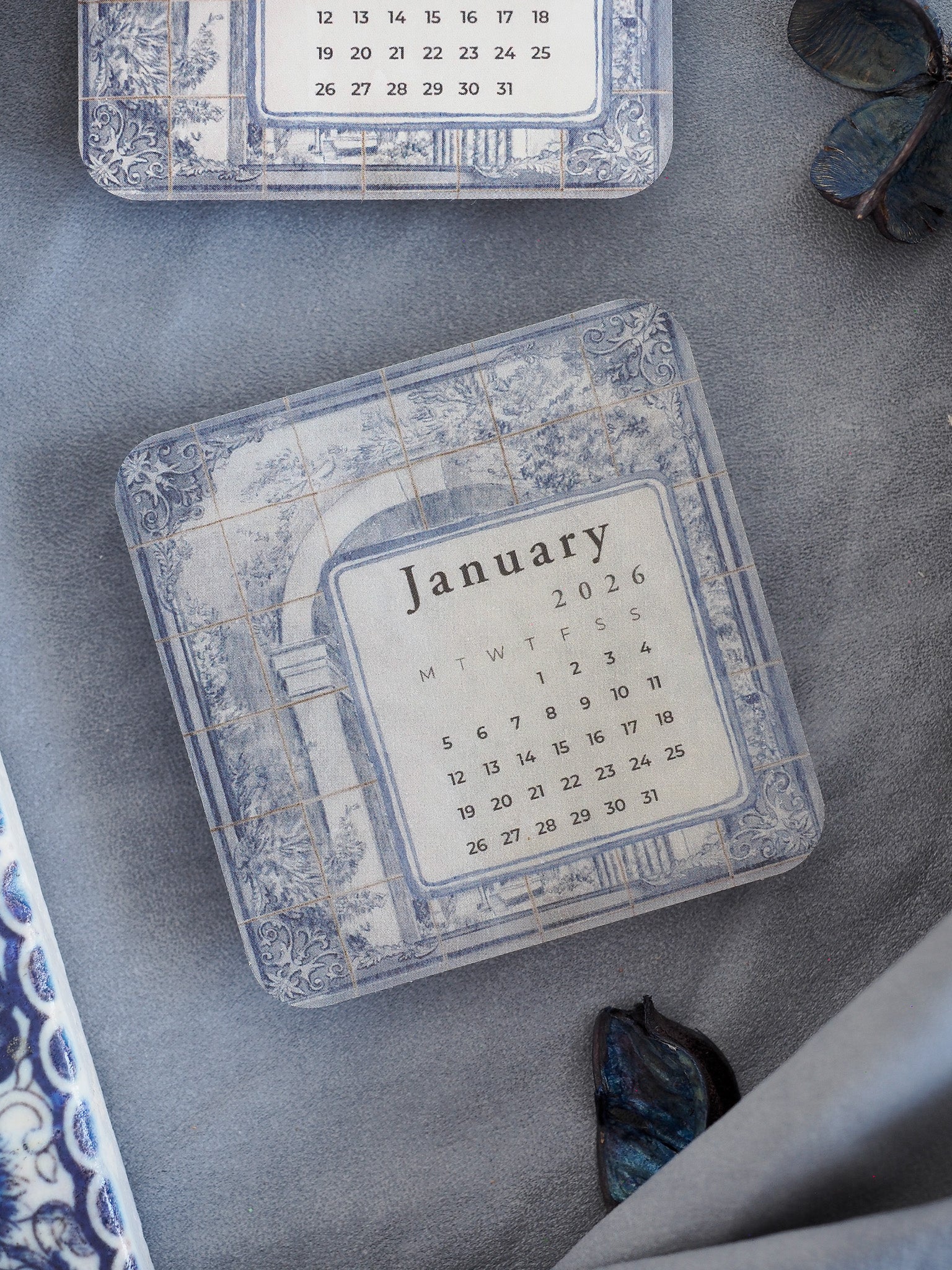 Elegant January 2026 calendar sticker featuring a vintage, distressed tiled grid background with subtle blue, gray, and sepia accents.