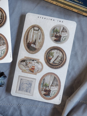 Collection of vintage-style picture frame stickers featuring nostalgic interior vignettes and decorative borders, perfect for scrapbooking or journaling.