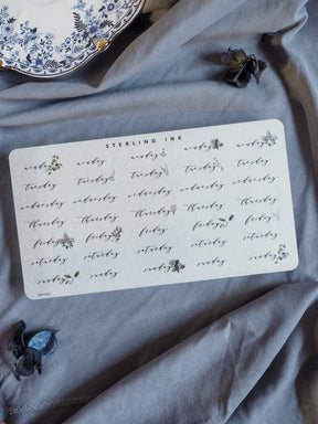 Minimalist weekly planner stickers featuring the days of the week in simple black ink, perfect for organizing schedules and journaling.