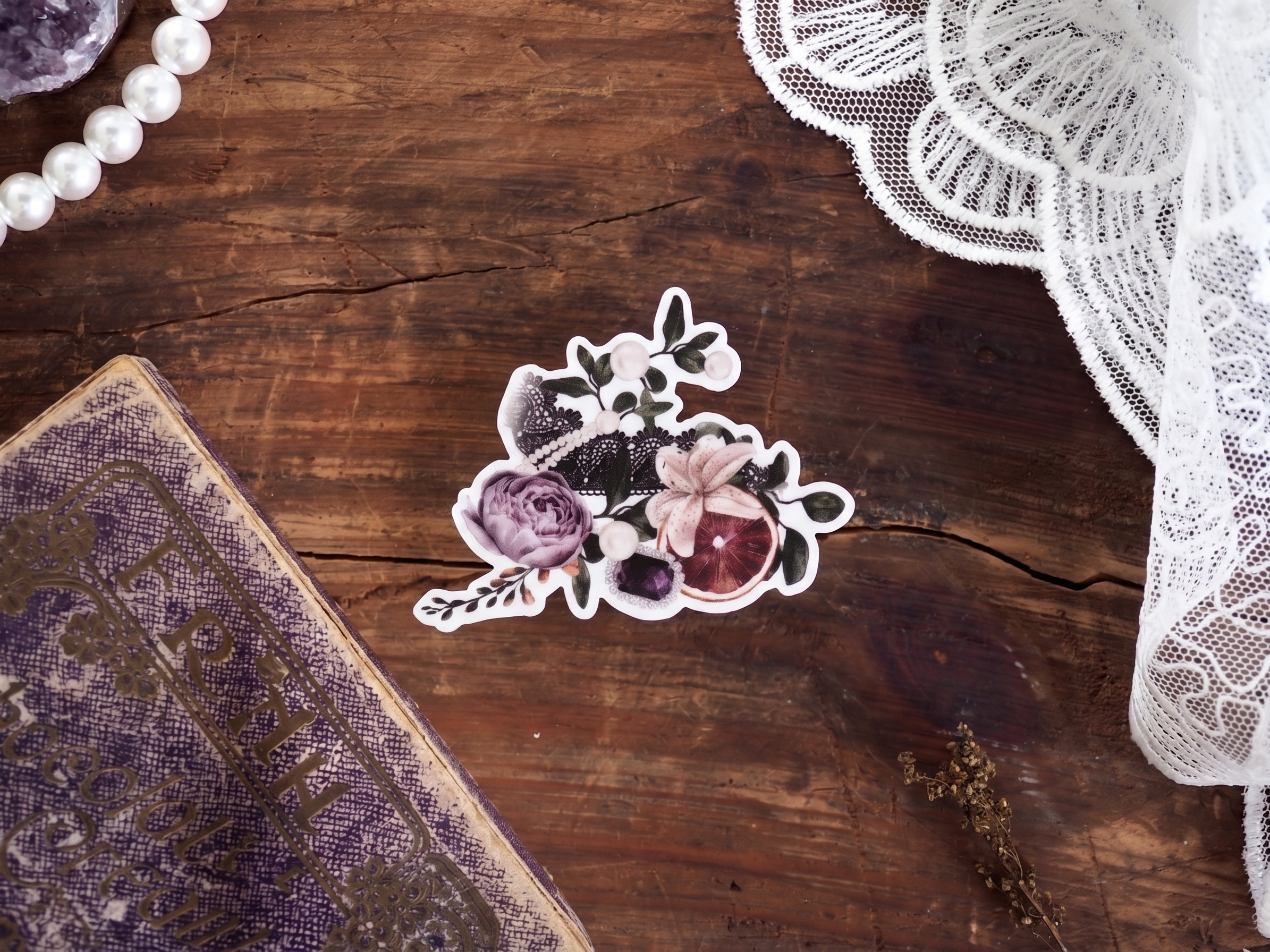 Botanical die-cut sticker featuring a cluster of purple, dusty pink, and cream roses, perfect for scrapbooking or vinyl crafting.
