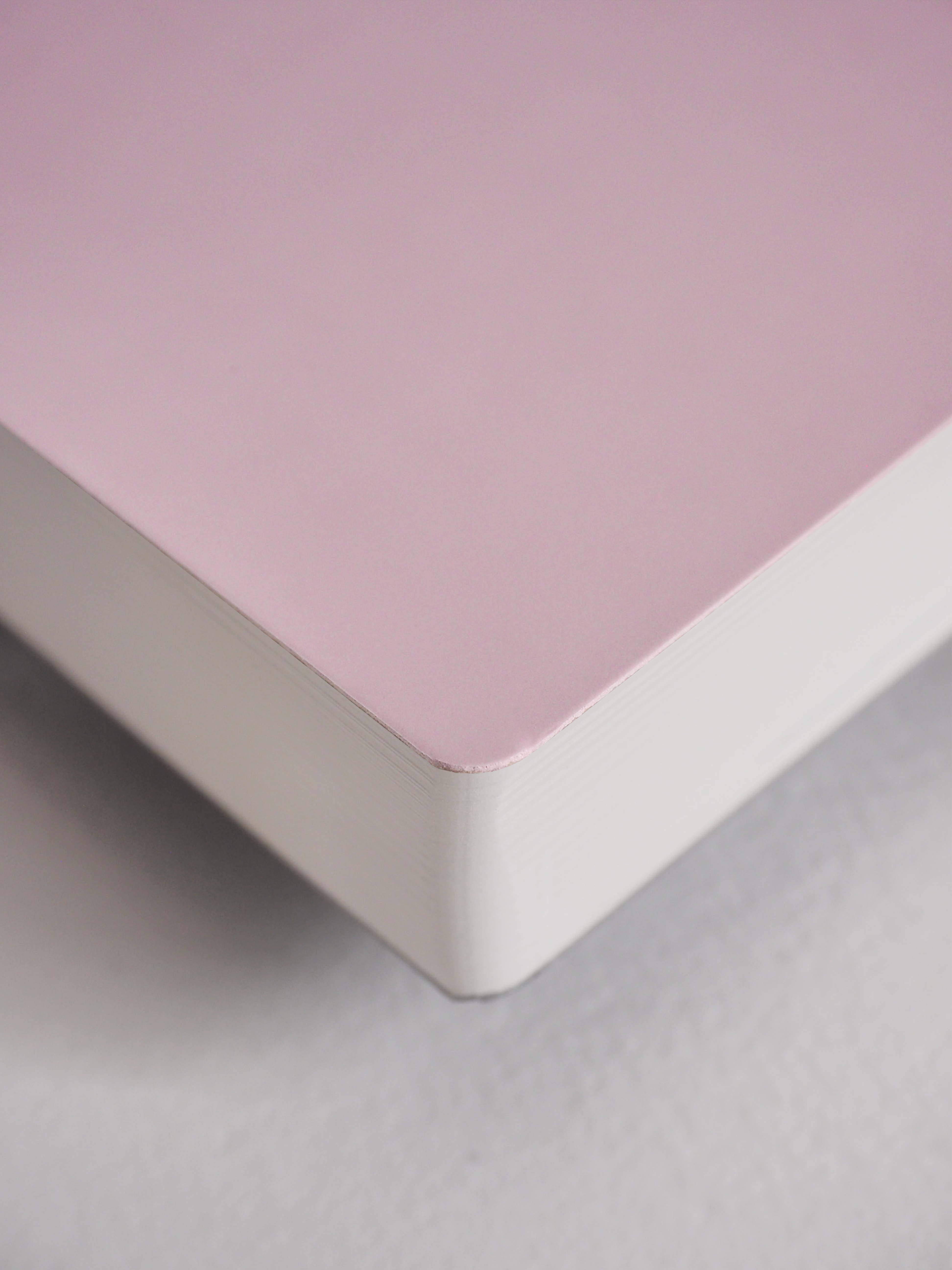Solid blush pink A5 undated planner notebook, featuring a smooth cover perfect for full-year journaling and daily organization.
