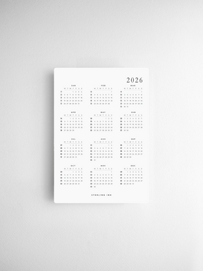 Clean and minimalist A6 printable calendar cards for 2026, featuring a detailed black and white grid layout across all twelve months for year-long planning.