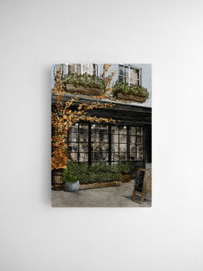 Autumn foliage illustration featuring bright yellow and orange leaves draped over a quaint storefront and potted greenery.