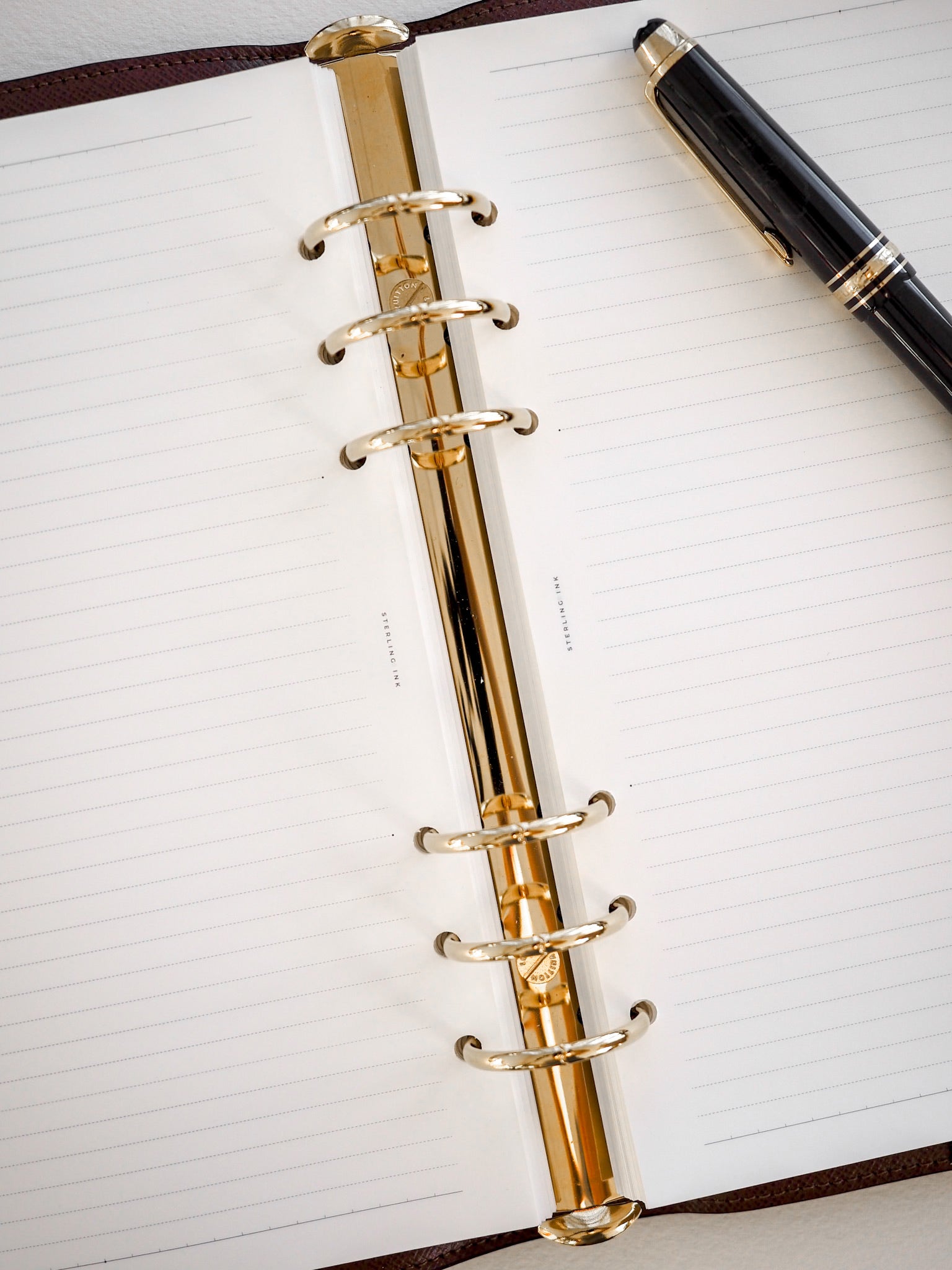 Gold spiral-bound loose leaf paper with ruled 5mm lines, ideal for Tomoe River journaling and structured note-taking.