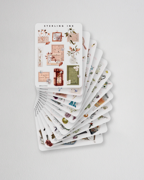 Annual collage sticker set featuring twelve monthly designs of vintage ephemera, delicate florals, and scrapbooking elements for journaling and planning.
